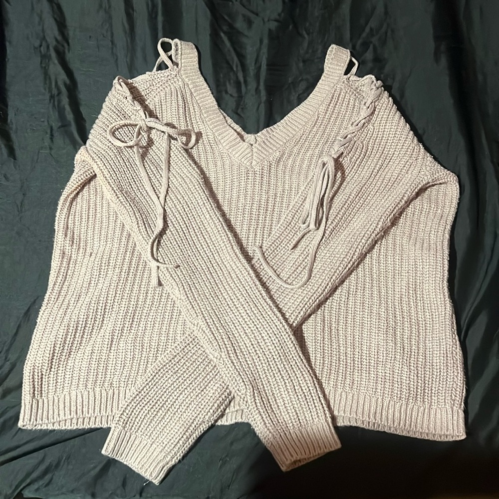 worn only a few times. fits bigger than just xs. nothing wrong with her.